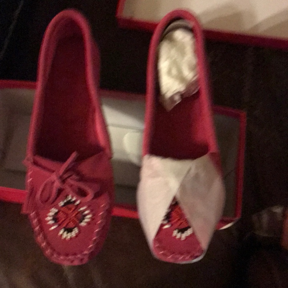 Pink moccasins never worn